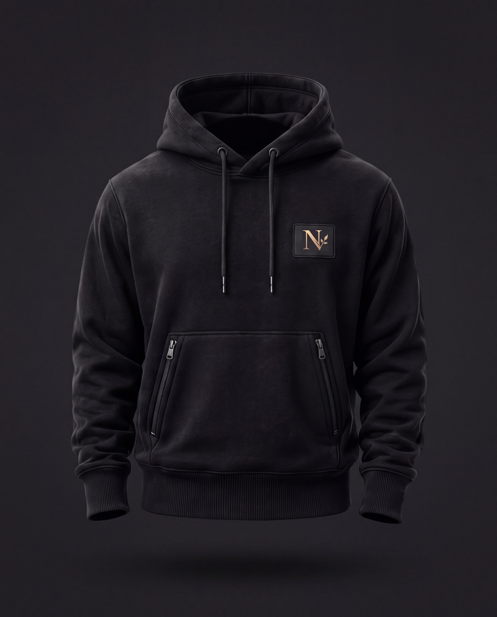 The Rooted Hoodie in True Black on a deep charcoal backdrop